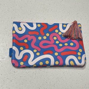 Colorful and cute cosmetic bag with tassel zipper pull